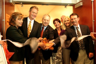 Dignitaries '‘cut the floss” at the grand opening of the Delta Dental of Idaho Dental Residency Clinic at ISU.  From left, Jean de Luca, Lt. Gov. Brad Little, ISU President Arthur Vailas, Linda Hatzenbuehler, Brian Crawford, Pam Powell and Terry Brady.