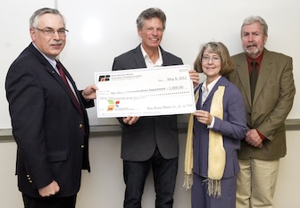 From left, Farm Bureau VP Phil Joslin, and ISU's Timothy Frazier, Martine Beachboard and Richard Smith.