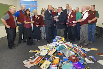 Members of the Pocatello Chamber of Commerce join dignitaries from Cooper Norman Certified Public Accountants and the ISU College of Business to participate in a ribbon-cutting ceremony for the new Cooper Norman Learning and Resource Center that will be built in the ISU College of Business. (ISU Photographic Services)