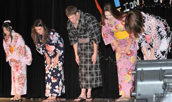 Performers from an earlier International Night take a bow. (ISU Photographic Services)