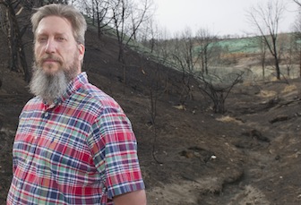 Keith Weber at Charlotte fire site near Pocatello. (ISU Photographic Services)