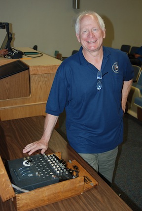 Timothy Mucklow with the WWII ENIGMA encryption device he will be giving presentations on Sept. 5 at ISU. 