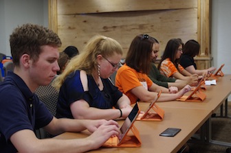 Idaho State University College of Arts and Letters' students learn using iPads as part of an initiative to transform teaching and learning and give students the technology skills they need for the future. Computer tablets were introduced on the first day of the semester in select classes with plans for future computer tablet roll outs funded by the community. (Photo credit: Calvin Cotten/Idaho Sta