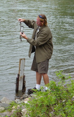 ISU chemistry Professor Jeffrey Rosentreter taking a sample in Yellowstone National Park.