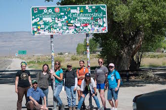 Leif Tapanila (front, lower left) and field trip participants in June 2014 on Nevada's Extraterrestrial Highway, in the middle of the Alamo impact crater.
