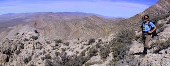 Julia Steenberg, coauthor and ISU Master of Science geology graduate, in the southern Nevada mountains 100 miles north of Las Vegas. The Alamo impact rocks are exposed as far as the eye can see. 