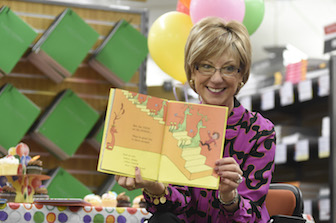 ISU First Lady Laura Vailas shares a Dr. Seuss tale with children from the Early Learning Center.