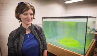 ISU graduate student Meghan Fisher in ISU Volcanic Simulation Laboratory. (Photo by Bethany Baker, ISU Photographic Services)