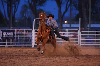 Shelby Freed competing in the goat tying event at a rodeo this season.