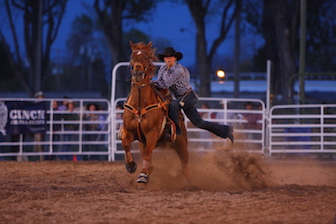 Shelby Freed competing in the goat tying event at a rodeo this season.