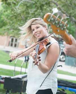 Clumsy Lovers' Chandra Johnson, on fiddle, will be back at ISU with the rest of the band on June 25 as part of the summer concert series. (Photo by Bethany Baker)